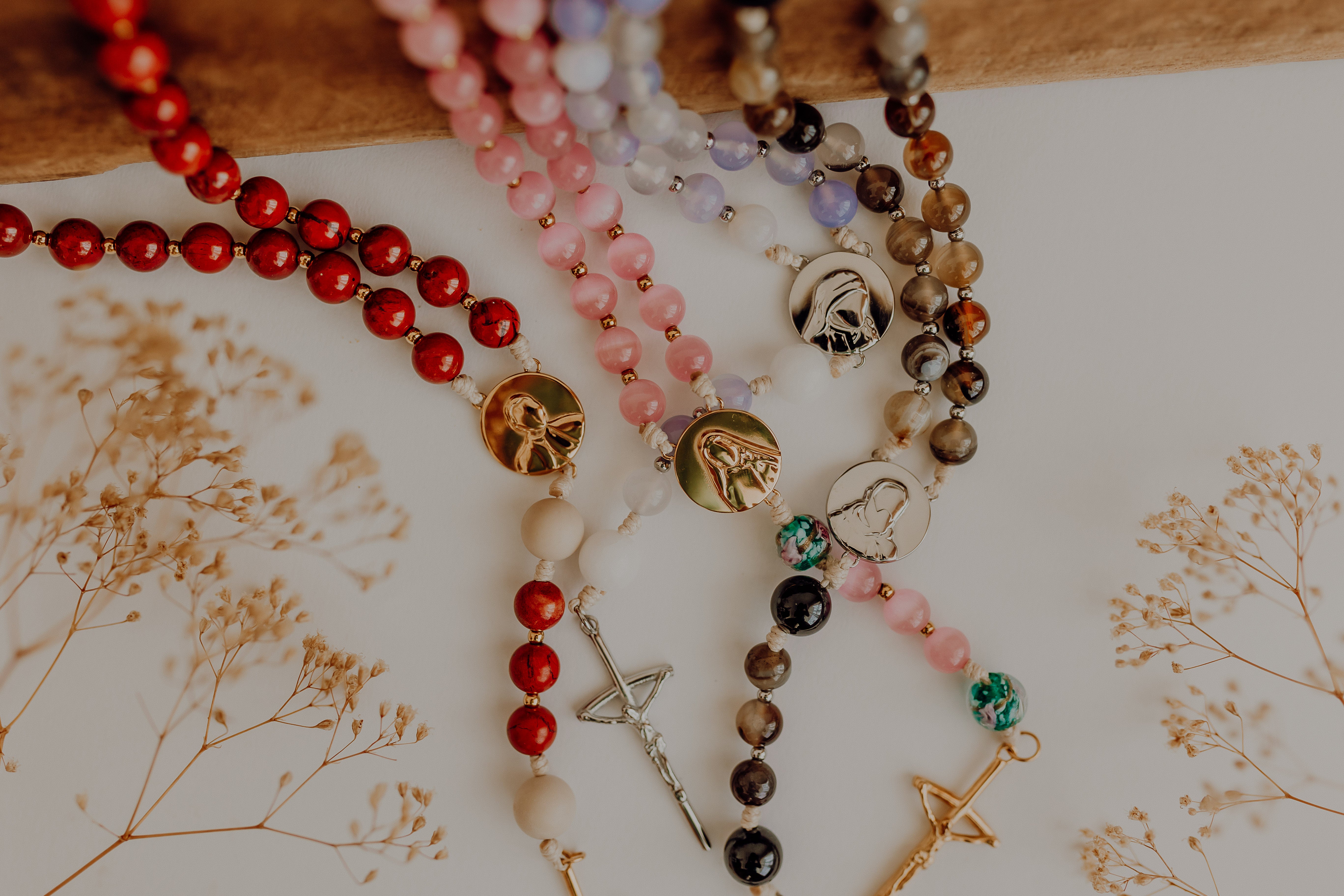 saint and scripture inspired rosaries and lifestyle products  for the everyday Catholic